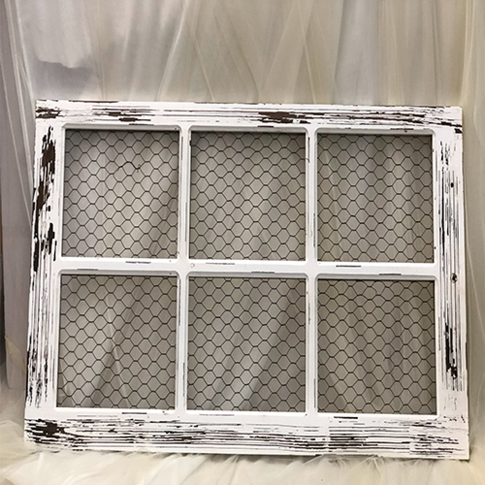 Rustic wood wall grid with wooden craft pegs